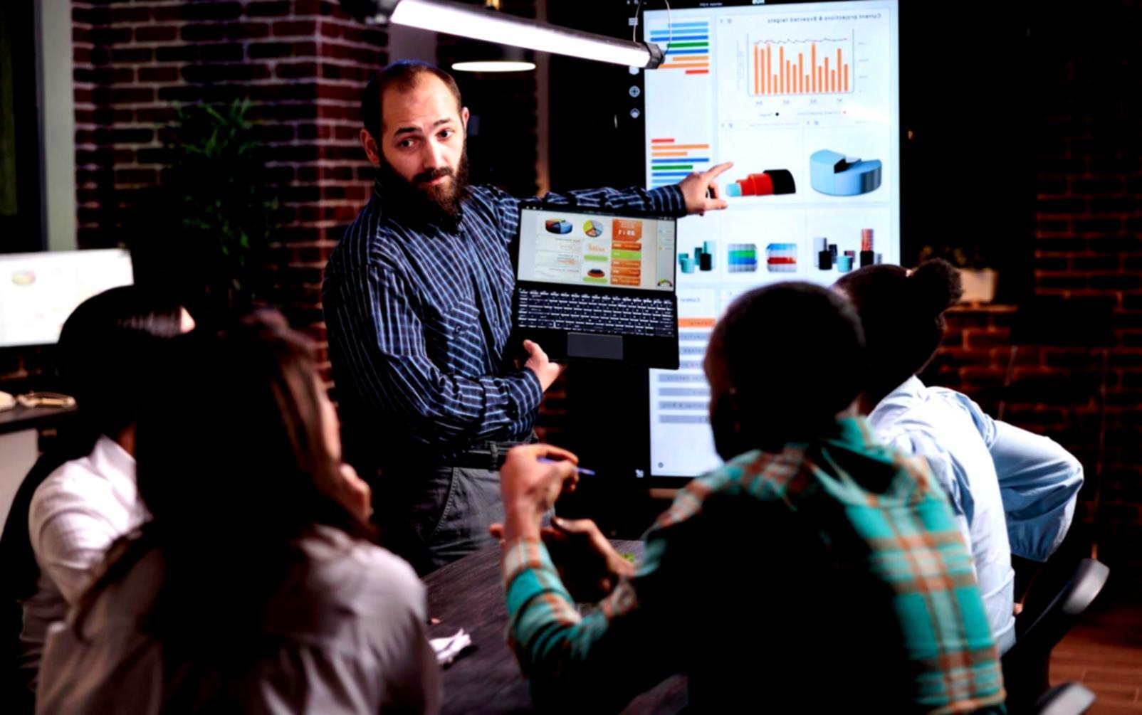 Financial analysts reviewing market data and charts in a modern office setting